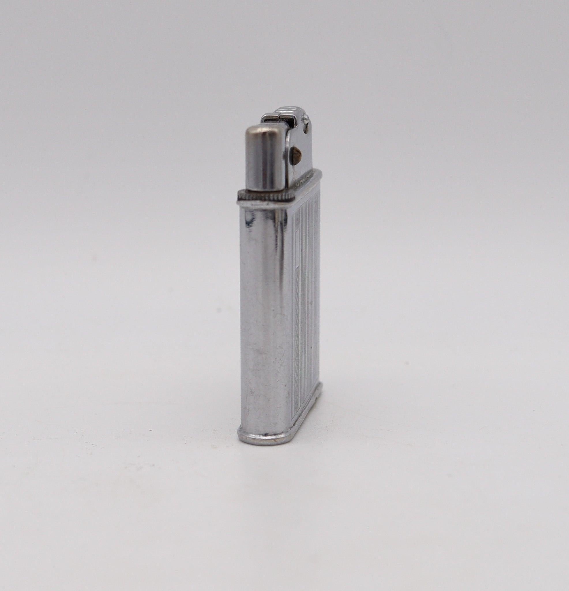Petrol pocket lighter designed by Robert Ernest Beney.

This is an unusual petrol pocket lighter, created in London England by the Beney company back in the 1940. This lighter is the Penge semiautomatic model and has been crafted with modernist art