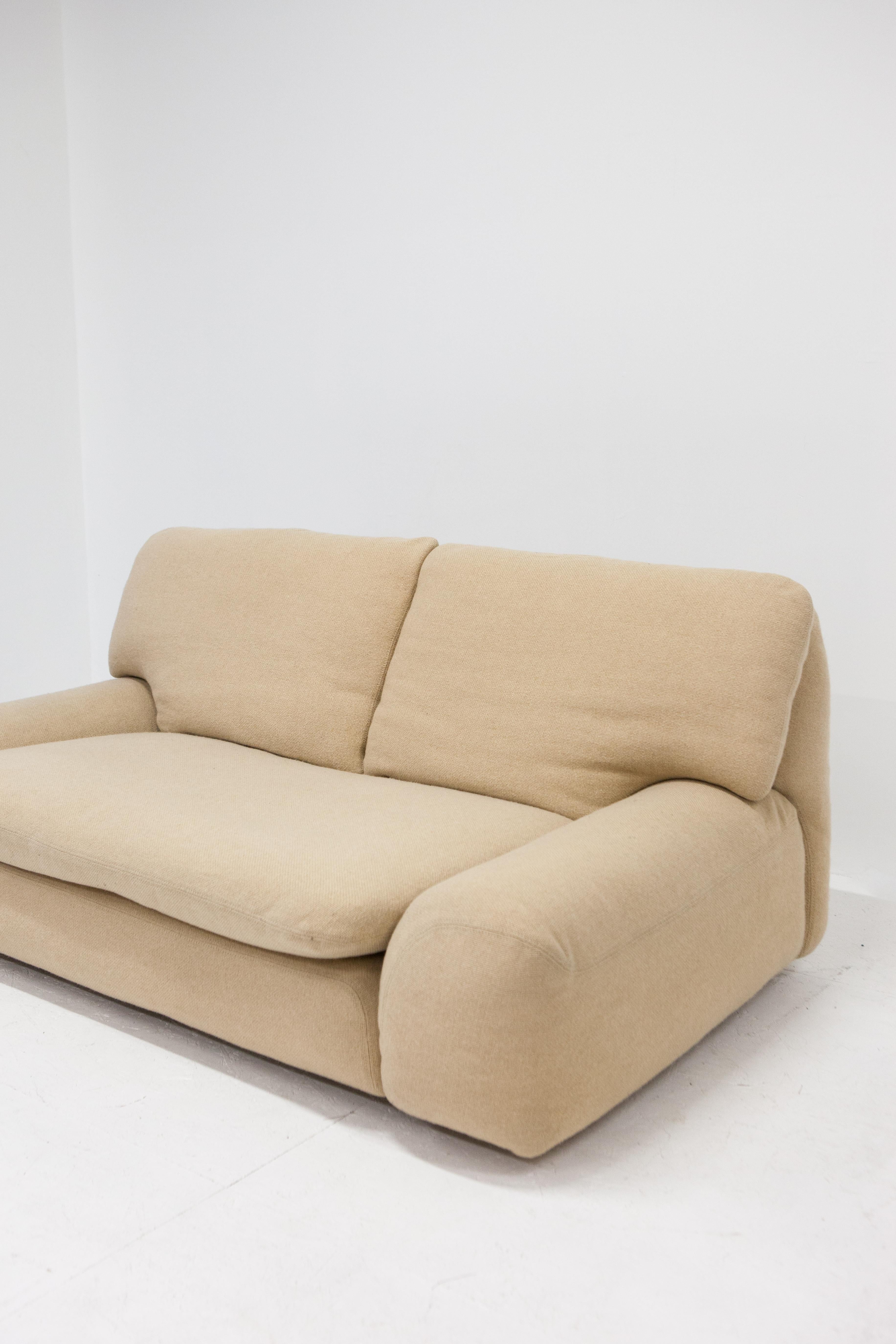 The Bengodi sofa is a rare design by one of our favourite Italian designers, Cini Boeri. It is powerful in its simplicity, being composed of clear, solid shapes. Our Bengodi sofa is upholstered in a pretty beige wool fabric which is still in good