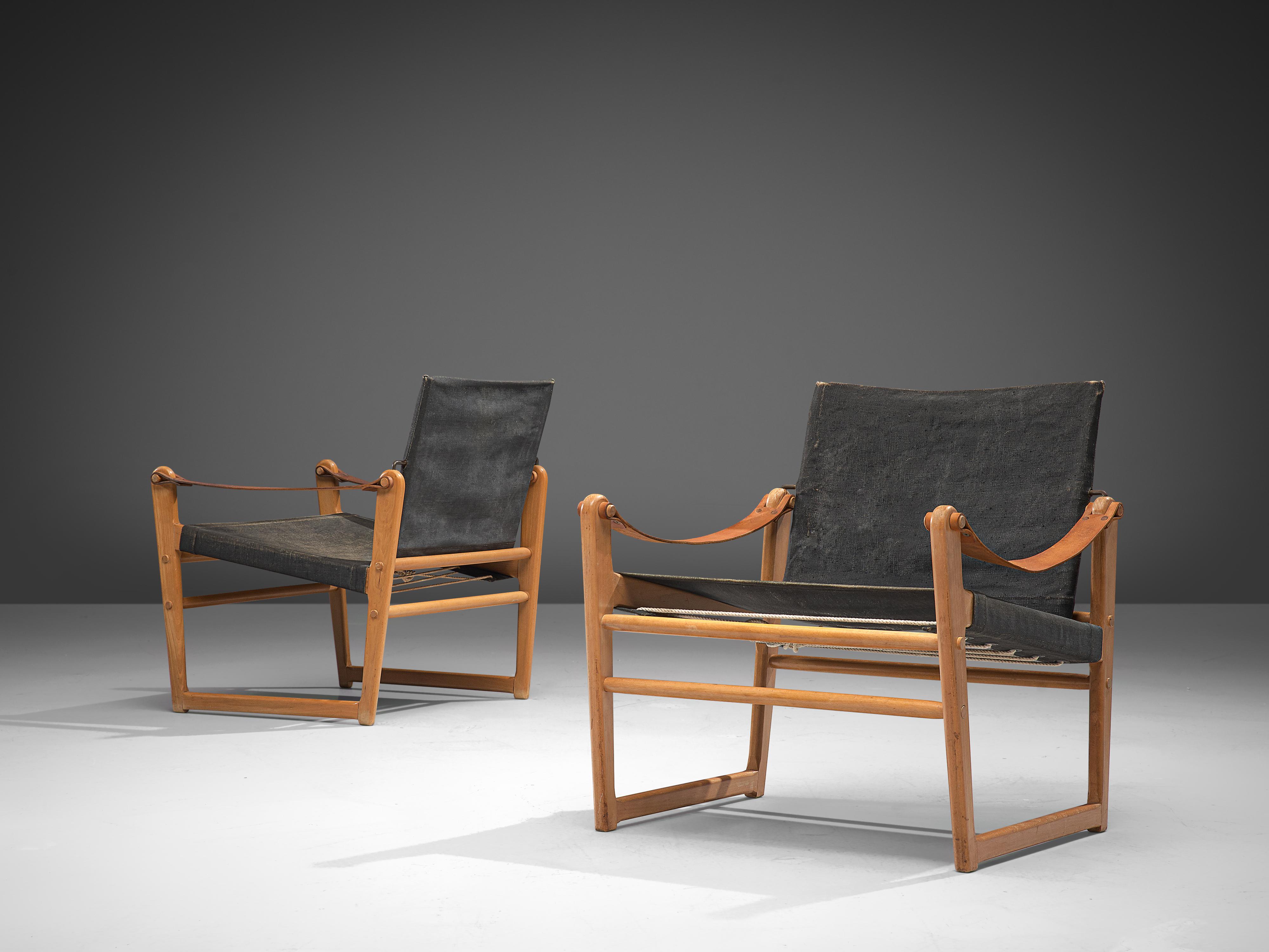Bengt Ruda, pair of 'Cikida' safari chairs, canvas, beech, leather, Sweden, 1960s

A lovely pair of safari chairs in a rare combination of the natural materials. A frame in beech is equipped with armrests in cognac leather. Seat and backrest are