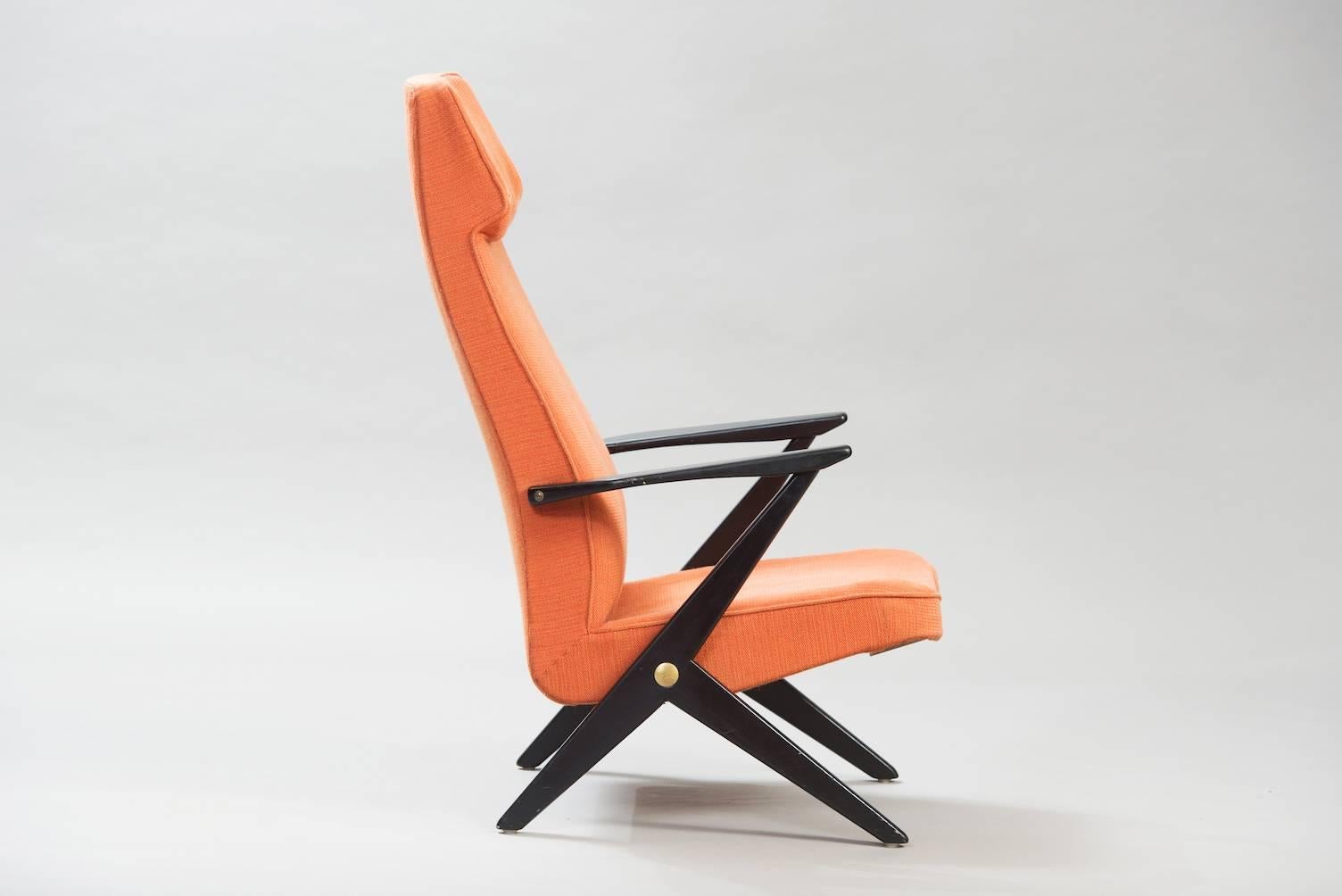 Black lacquered midcentury high back chair “Triva” for Nordiska Kompaniet.
Maker label underneath.