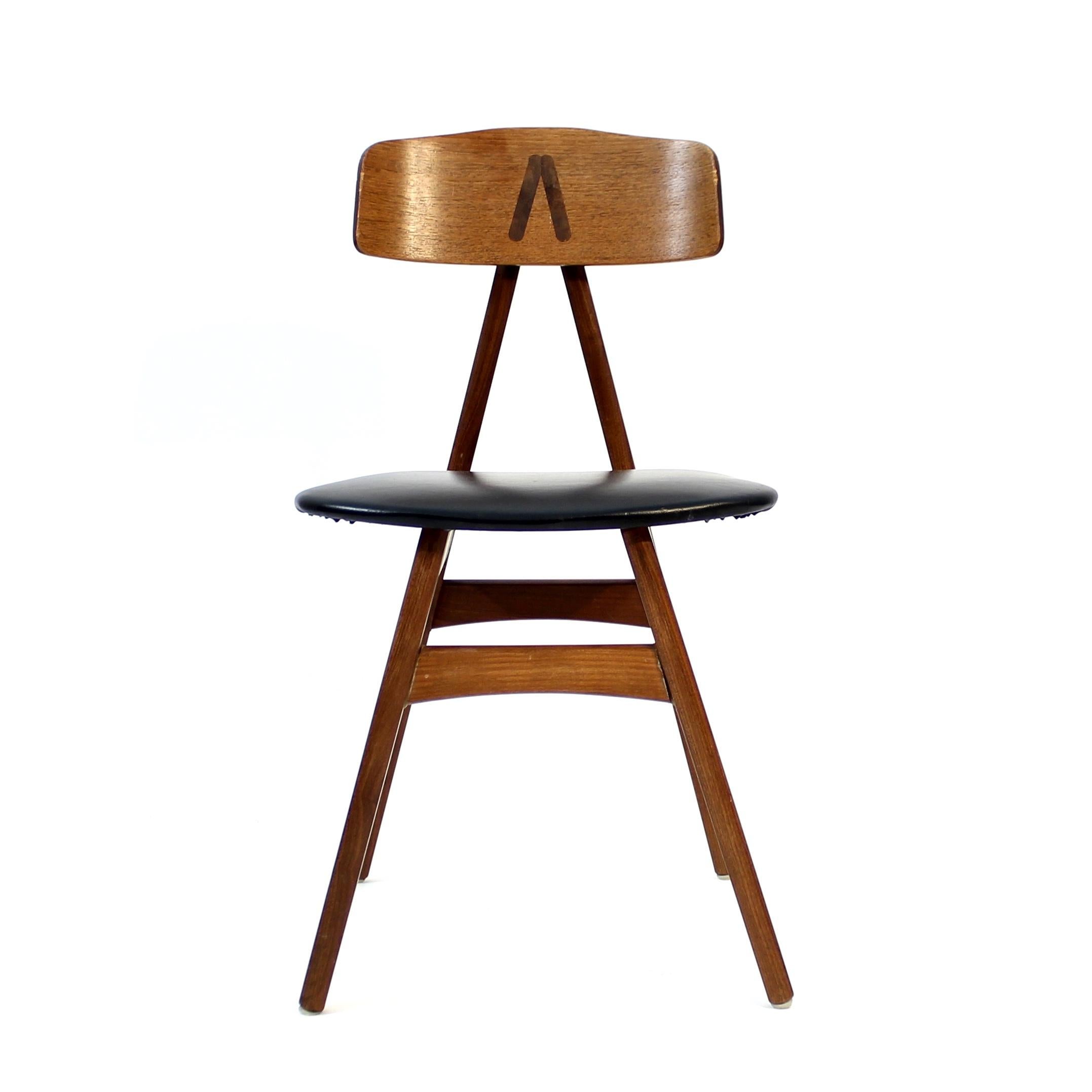  A-shaped teak chair with the original faux leather upholstery designed by Bengt Ruda for IKEA a in 1959. The chair made its debut in the Ikea catalogue of 1960 and were only produced for a few years so not very many were made. As much of the early
