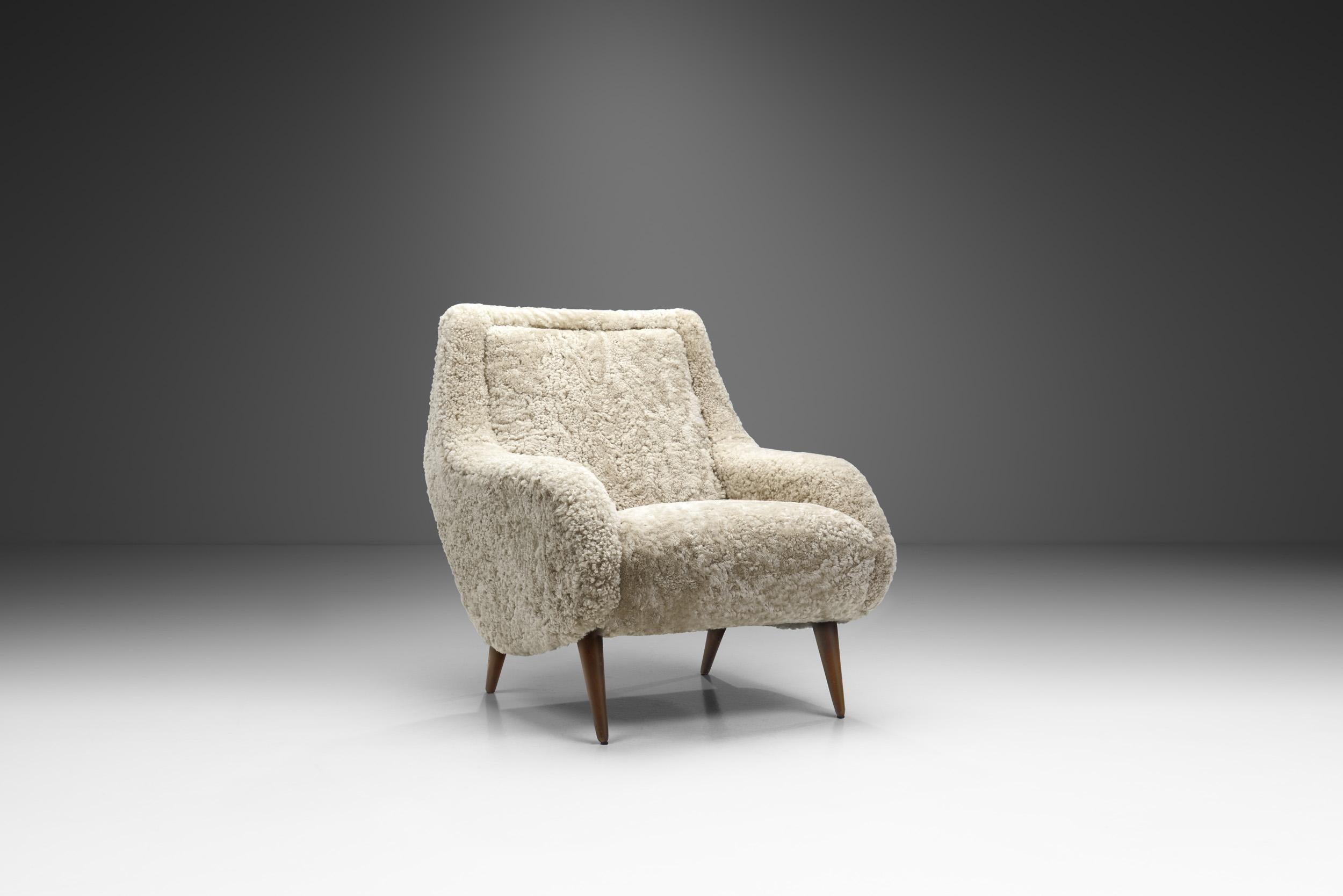 This lounge chair model known as “Ombord” was designed by Ruda for the legendary company, Nordiska Kompaniet. NK was often the first to introduce new products on the Swedish market, such as jeans, nylon stockings, TVs and Barbie dolls, and the list