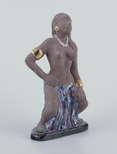 Bengt Wall, Sweden. Figurine of a Bali girl. Raw and glazed ceramic
