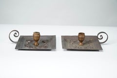 Benham and Froud London. A pair of Arts and Crafts copper night candle holders