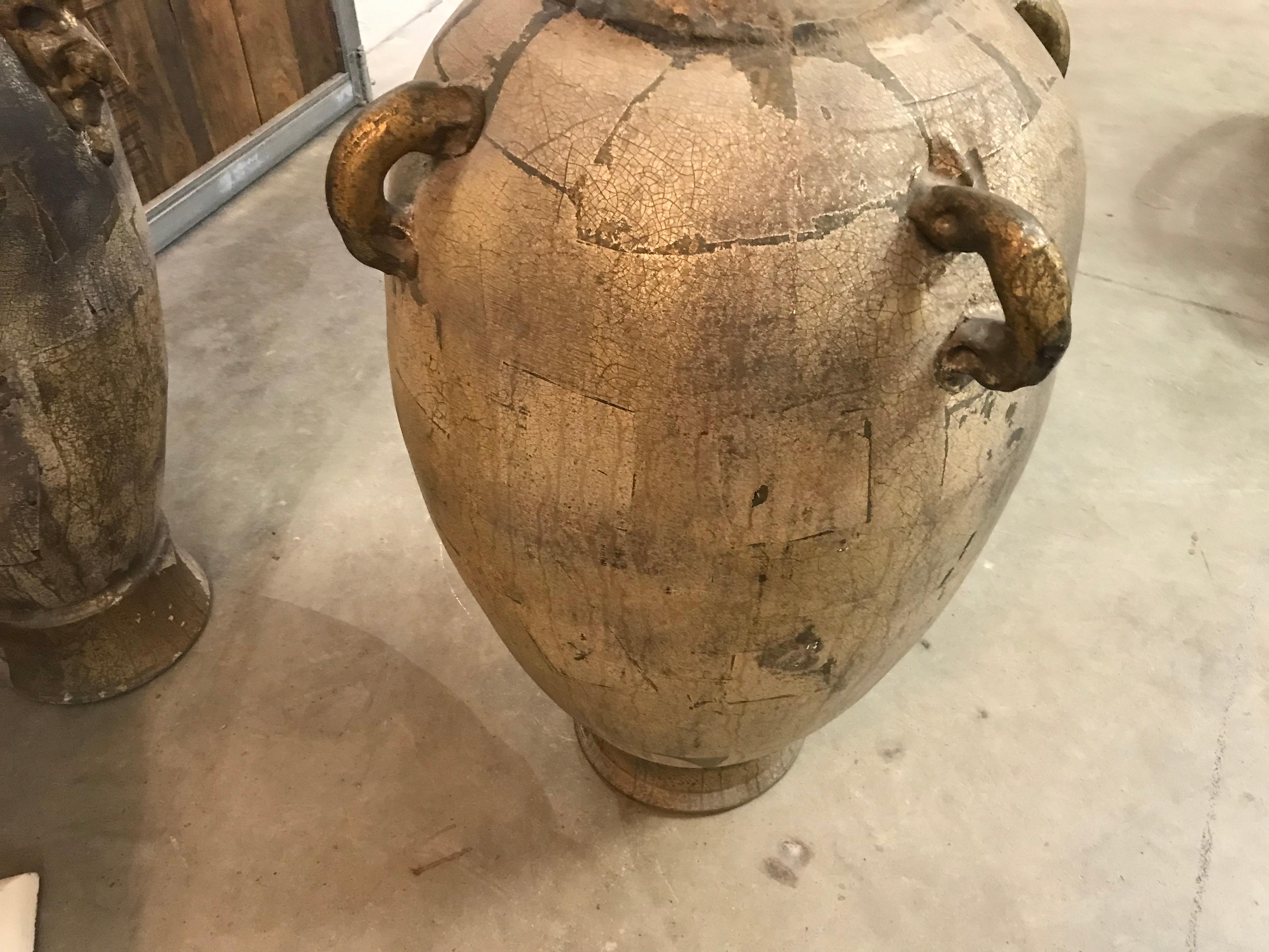 This amazing vase has nice patina. The faces are very cool.