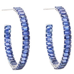 BENJAMIN FINE JEWELRY Zafiro azul octógono de 22,56 cts Aros de eternidad de 18 quilates