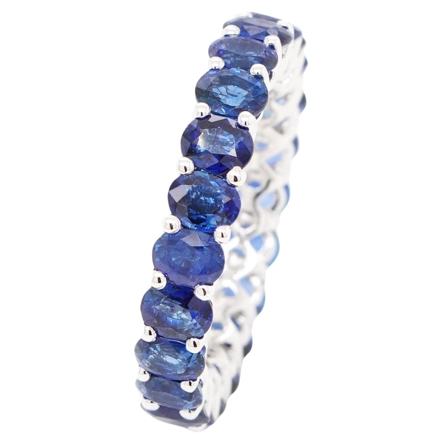 BENJAMIN FINE JEWELRY, bague d'éternité 18 carats avec saphir bleu ovale 6,41 carats