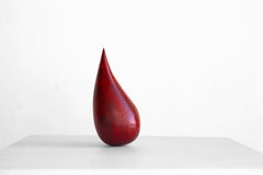 Strappo - Legno Padauk intagliato, zavorra interna in piombo