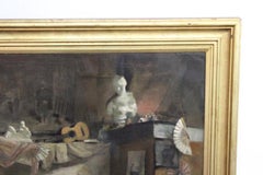 Woman posing in artist studio interior with antique objects