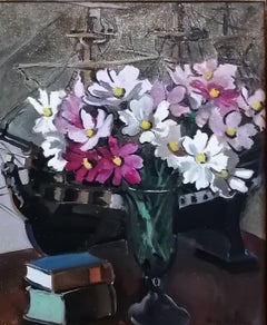 Still life bouquet of flowers and books