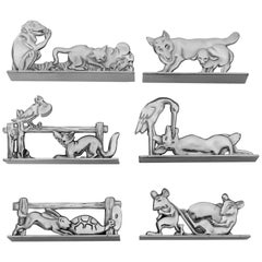 Rare porte-couteaux en argent signé Benjamin Rabier de six pièces, Fables de La Fontaine