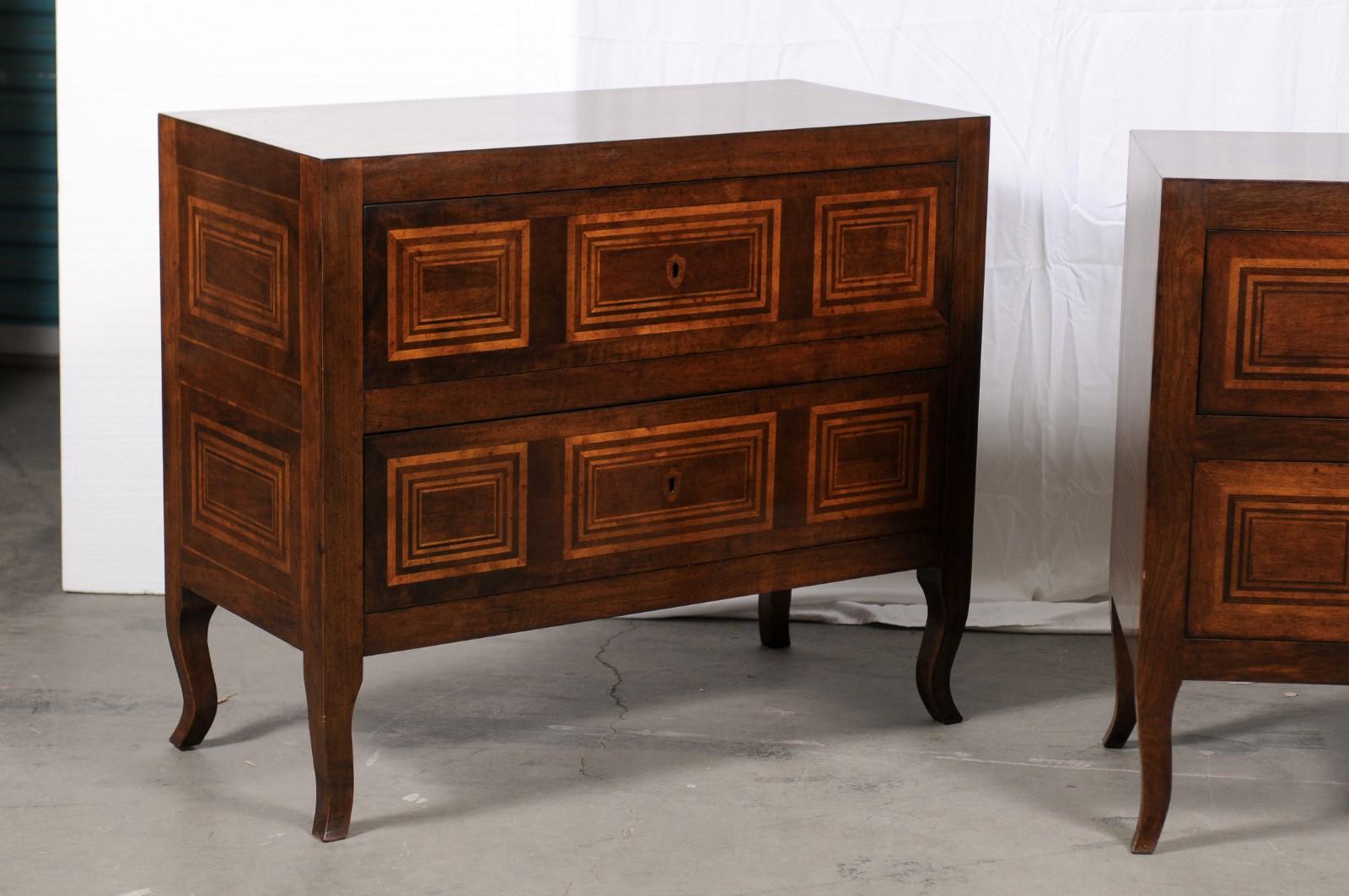 Bennett Italian handmade chest. The top fits the conforming case which features two drawers, and rests on cabriole legs. The chest is inlaid with wood throughout: on the top, the drawer fronts, and the sides.
There are two available and they may be