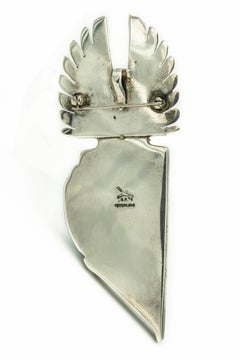 Spilla con ciondolo figurativo in argento massiccio di Bennie Ration, nativo americano, Kachina