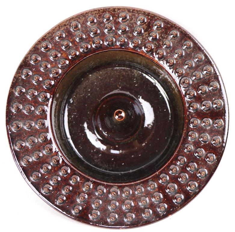 Rare form Bennington pottery disk ashtray, by David Gil. This example is in perfect condition, and fully and correctly marked. Great modernist American Art Pottery, sophisticated and architectural design, clean and ready to use.