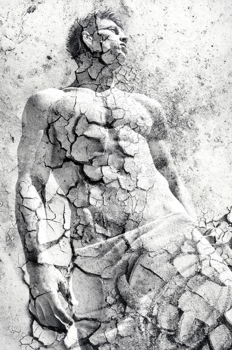 Benno Thoma Figurative Photograph - Dry Earth Sculpture (young nude male photo superimposed on cracked earth photo)