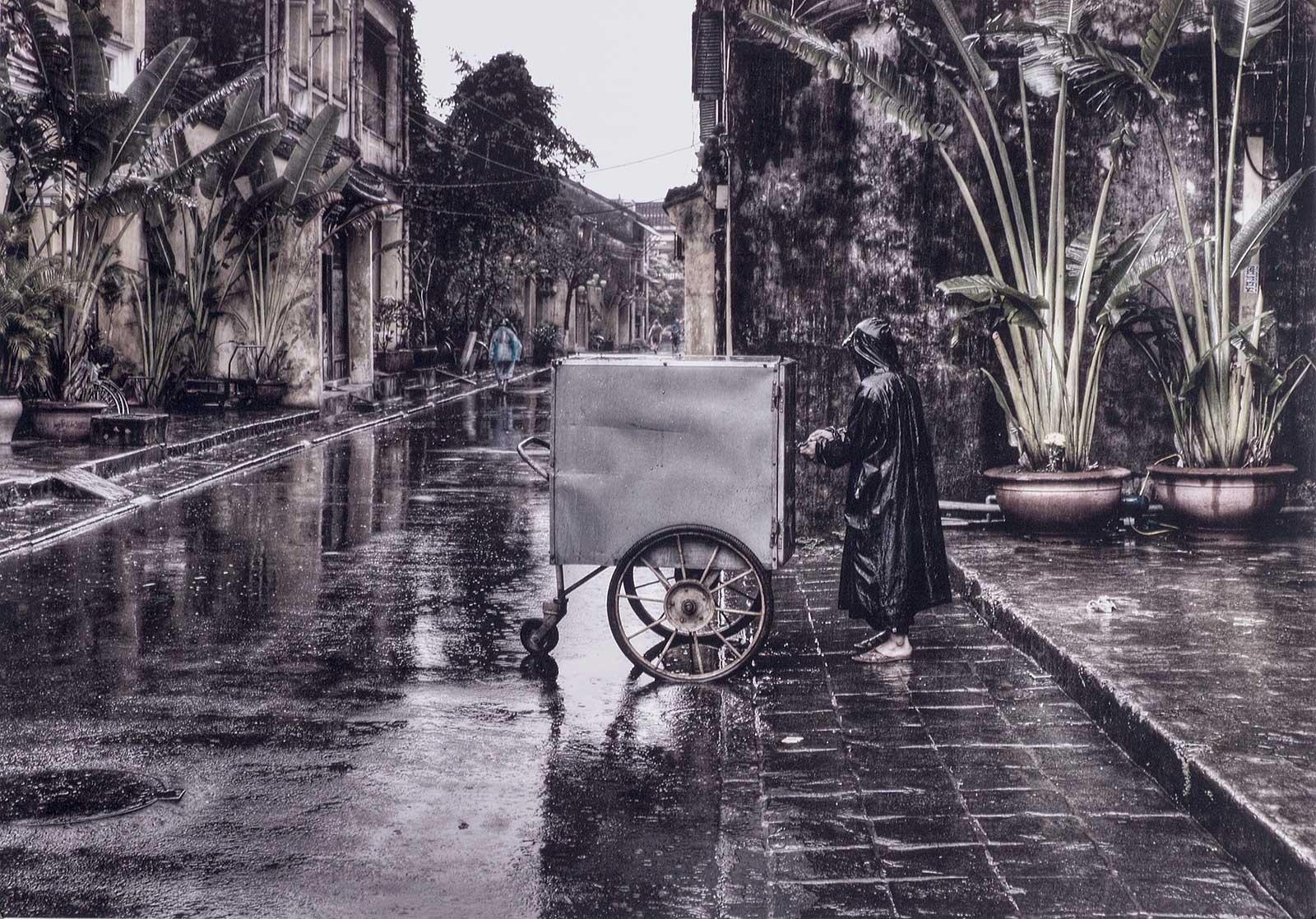 Early Morning (an atmospheric sense of a lone figure in Hoi An, Vietnam)