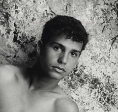 Jose, Cuba (shirtless teen boy in elegantly decadent architectural stairway)