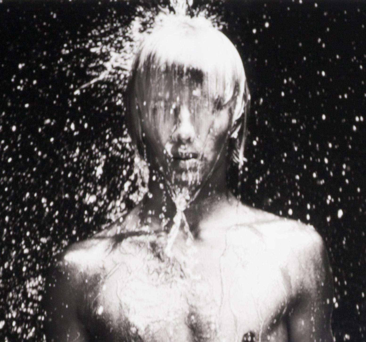 WET 11 (young nude Dutch boy being doused by droplets of water) - Photograph by Benno Thoma