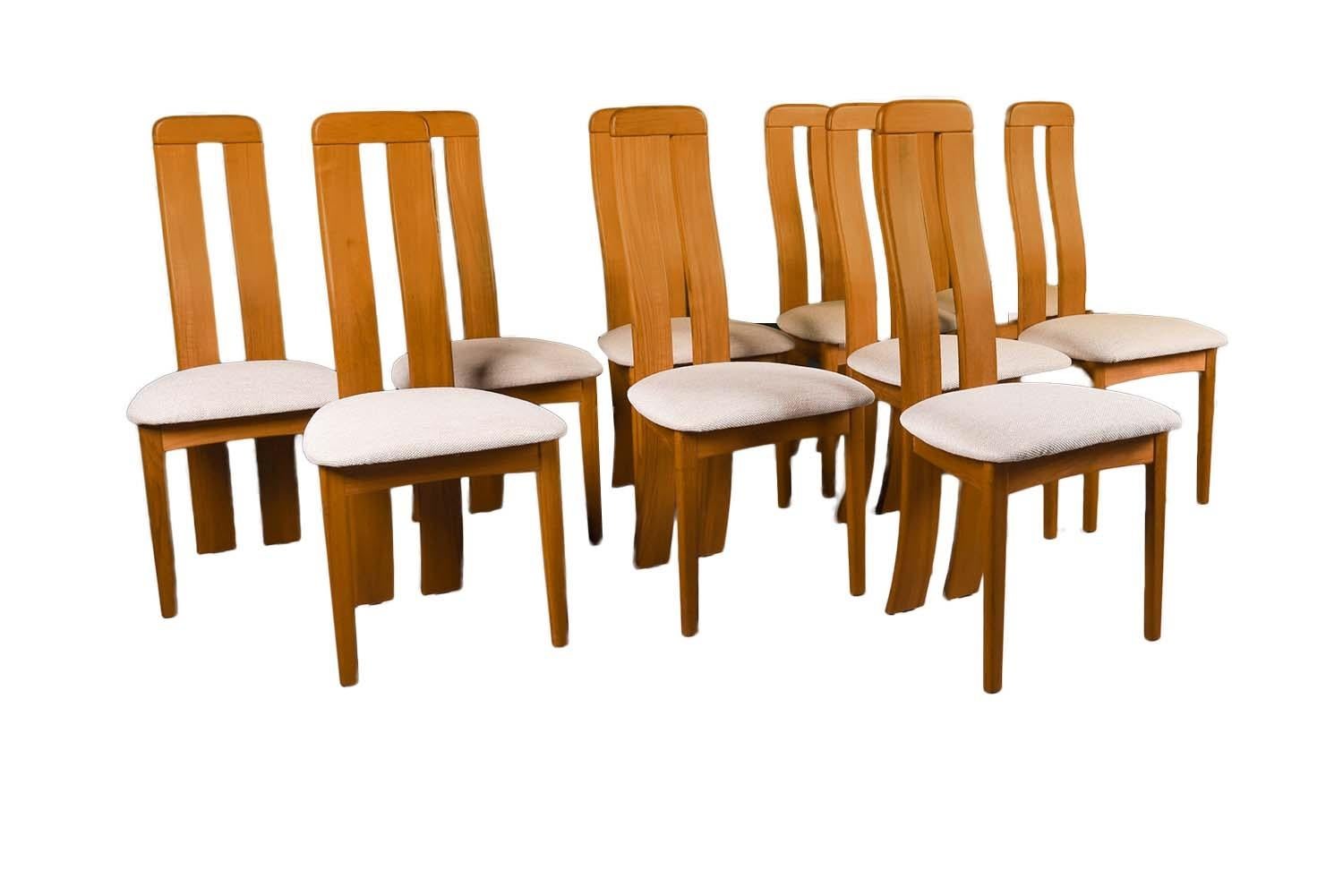 Spectacular set of 10 beautifully sculpted Danish Modern teak-dining chairs designed by Benny Linden. Maker’s label under seat {Benny Linden Design}. Superbly crafted, sculpted, modern teak dining chairs with padded seats. Featuring padded