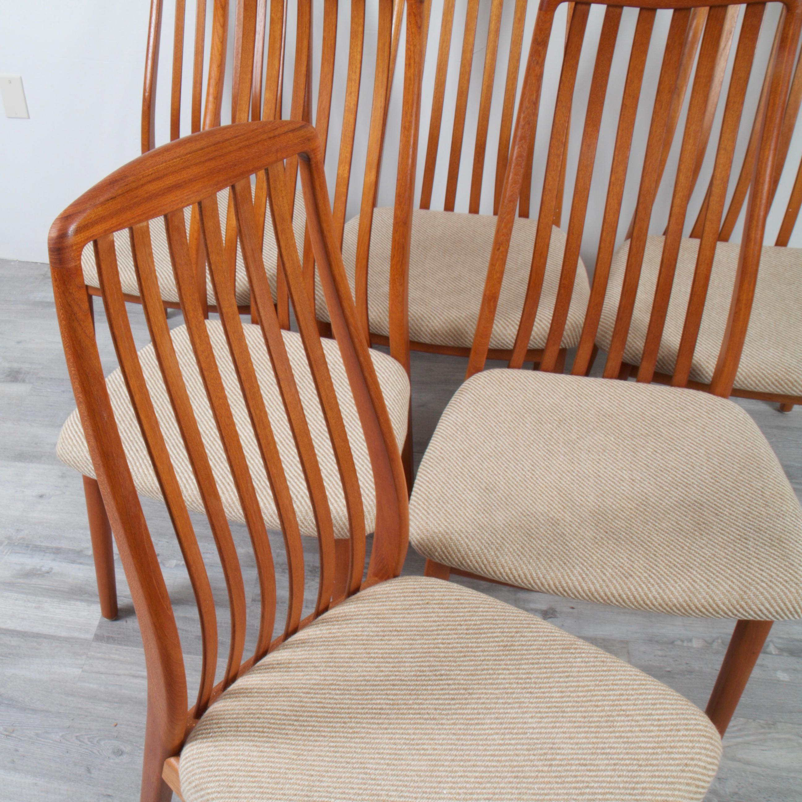 This is a 1960s vintage set of solid teak dining chairs by Danish designer Benny Linden. Original upholstery is still clean, but would benefit from some updated fabric.