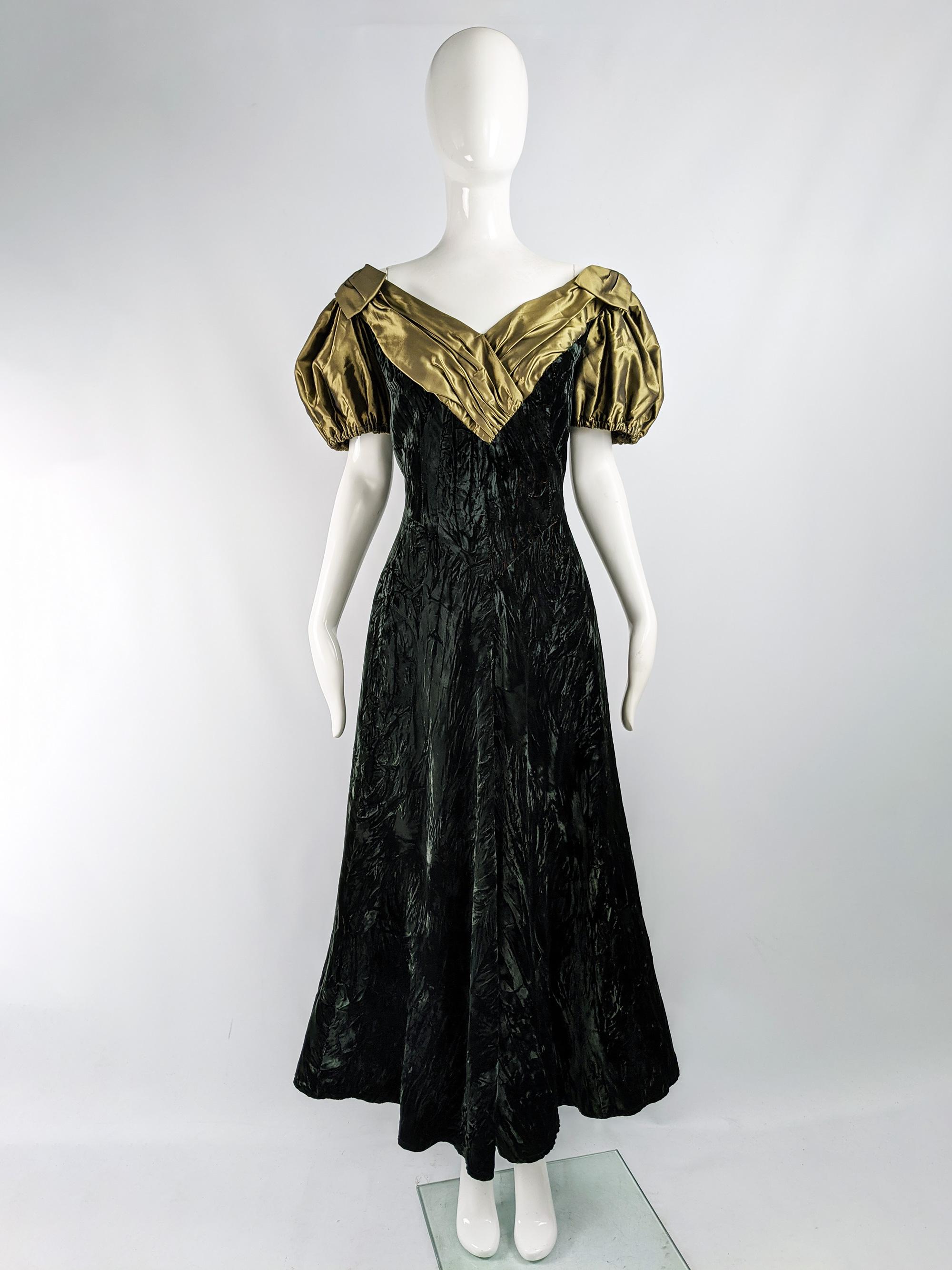 A stunning vintage evening dress from the 80s by luxury Singaporean fashion designer, Benny Ong, who has dressed the likes of Queen Noor of Jordan and Princess Diana. In a crushed darkest green velvet (almost black) with an orange iridescence and