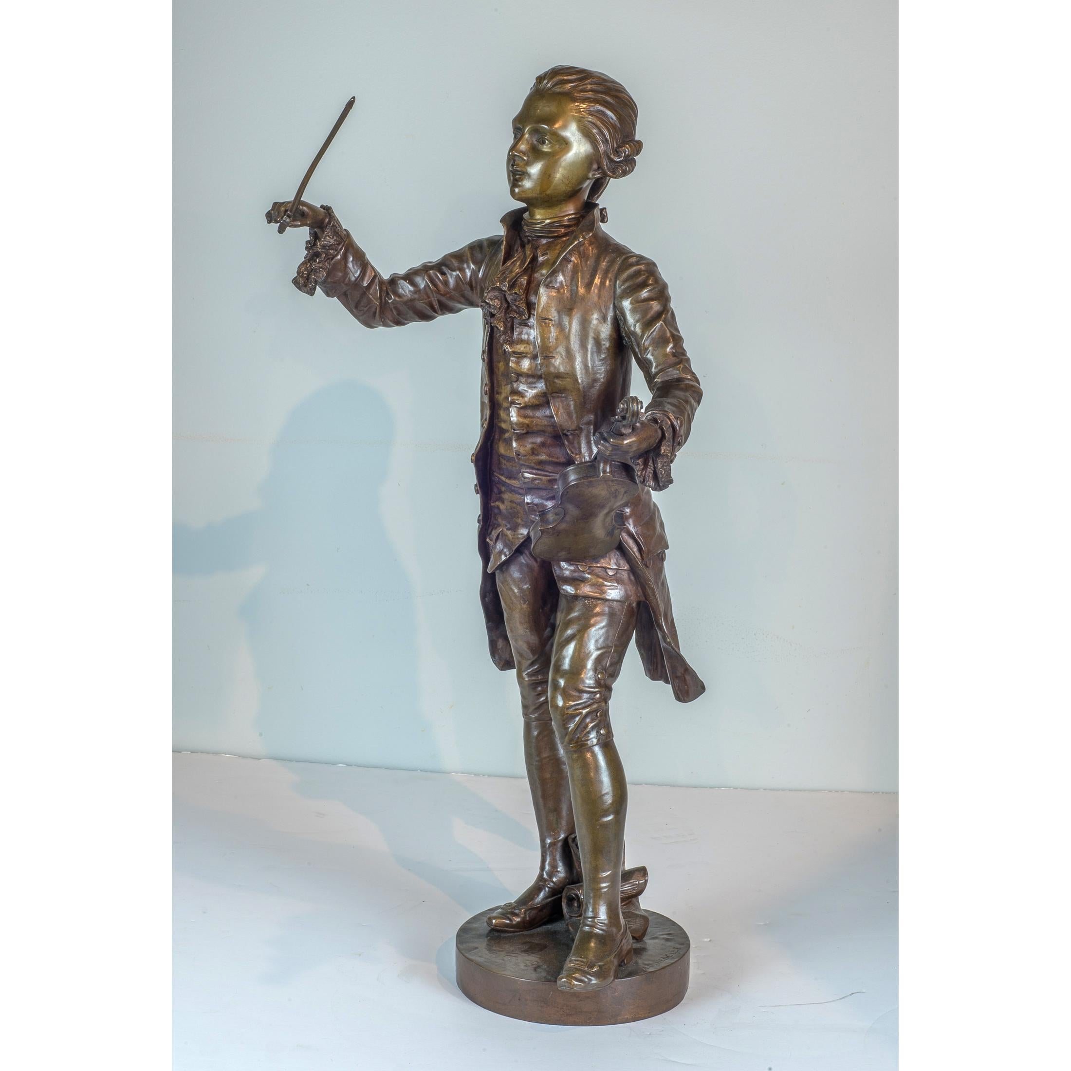 A Fine Patinated Bronze Statue of a Musician Holding a Violin by B.L. HERCULE - Sculpture by Benoit Lucien Hercule