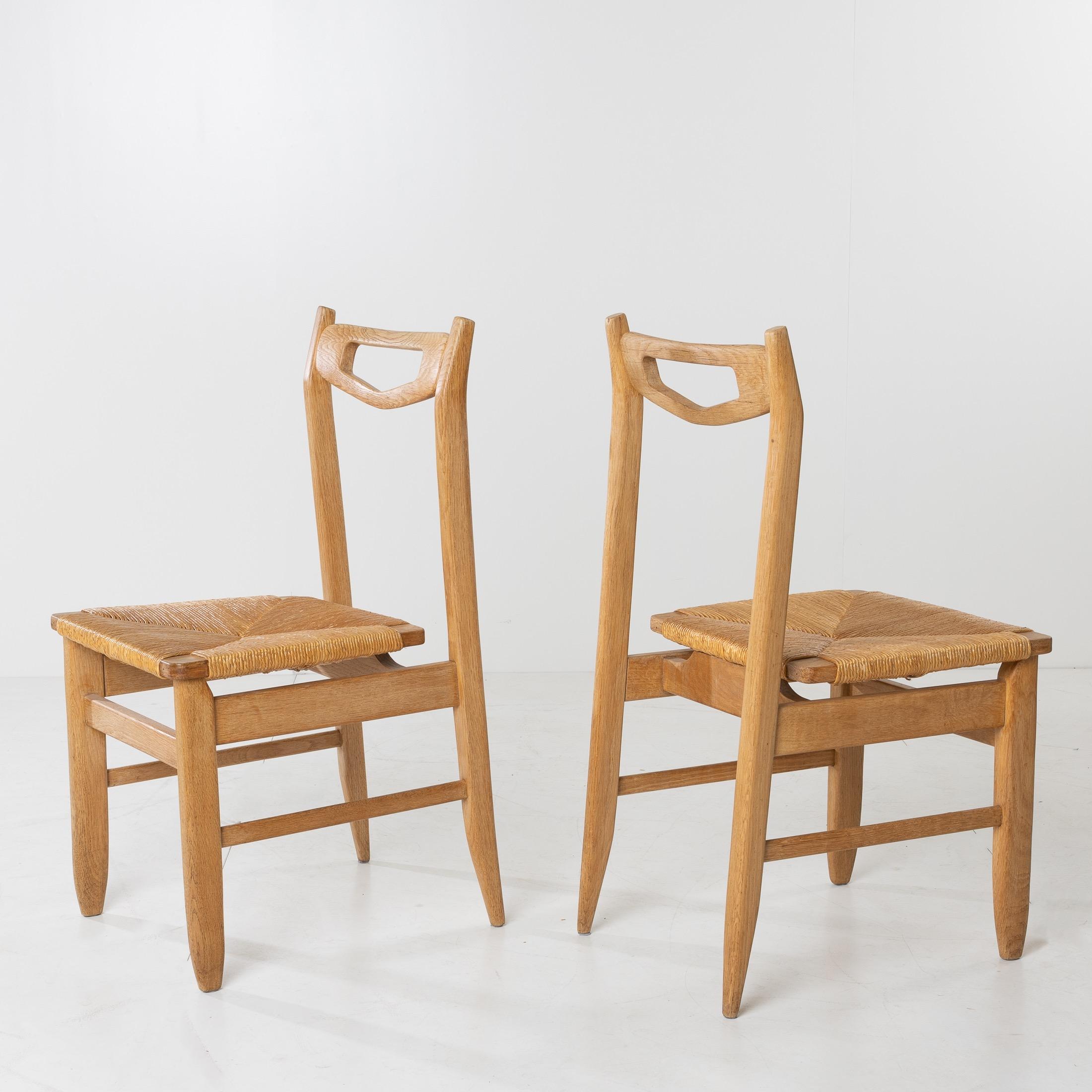 Chêne Benot, ensemble de 8 chaises de salle à manger par Robert Guillerme et Jacques Chambron, France en vente