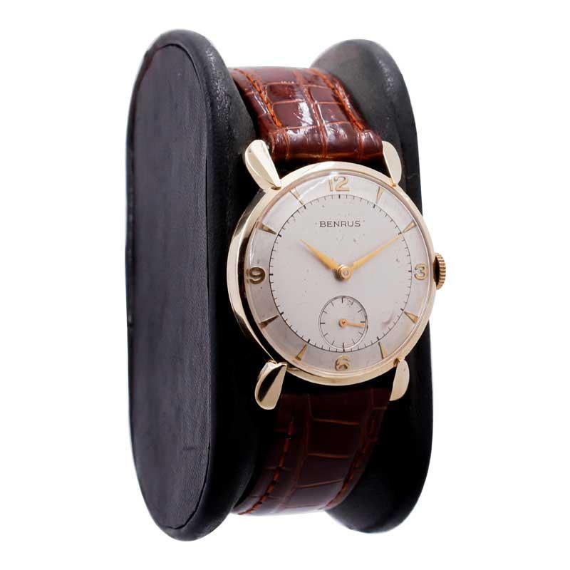 FACTORY / HOUSE: Benrus Watch Company
STYLE / REFERENCE: Art Deco
METAL / MATERIAL: 14k Solid Gold
CIRCA / YEAR: 1950's
DIMENSIONS / SIZE:  Length 35mm X Diameter 29mm
MOVEMENT / CALIBER: Manual Winding / 16 Jewels 
DIAL / HANDS: Original Two Tone