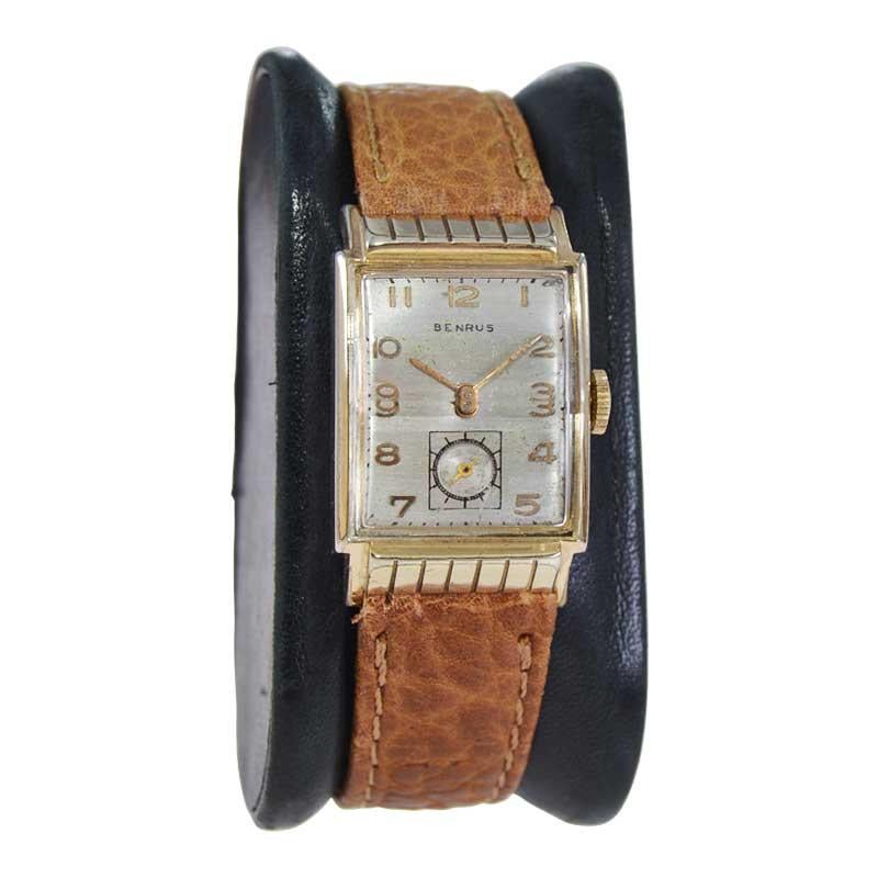 FACTORY / HOUSE: Benrus Watch Company
STYLE / REFERENCE: Art Deco Tank Style
METAL / MATERIAL: Yellow Gold Filled 
CIRCA / YEAR: 1940's
DIMENSIONS / SIZE: Length 34mm x Width 21mm
MOVEMENT / CALIBER: Manual Winding / 17 Jewels 
DIAL / HANDS: