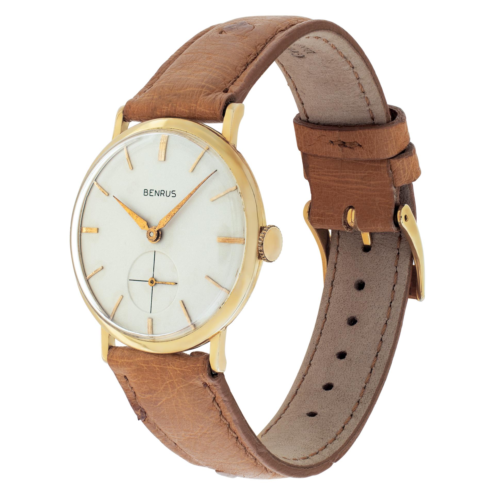 Gents Benrus in 14k yellow gold on tan leather strap. Manual wind w/ subseconds. Ref 98260. Fine Pre-owned Benrus Watch. Certified preowned Vintage Benrus Classic watch is made out of yellow gold on a Tan Leather band with a Gold Plate tang buckle.