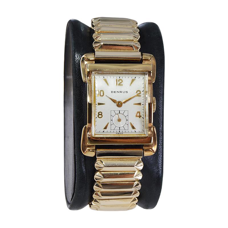 FACTORY / HOUSE: Benrus Watch Company
STYLE / REFERENCE: Art Deco / Tank Style
METAL / MATERIAL: Yellow Gold Filled
CIRCA / YEAR: 1950's
DIMENSIONS / SIZE: Length 35mm x Width 22mm
MOVEMENT / CALIBER: Manual Winding / 17 Jewels 
DIAL / HANDS: