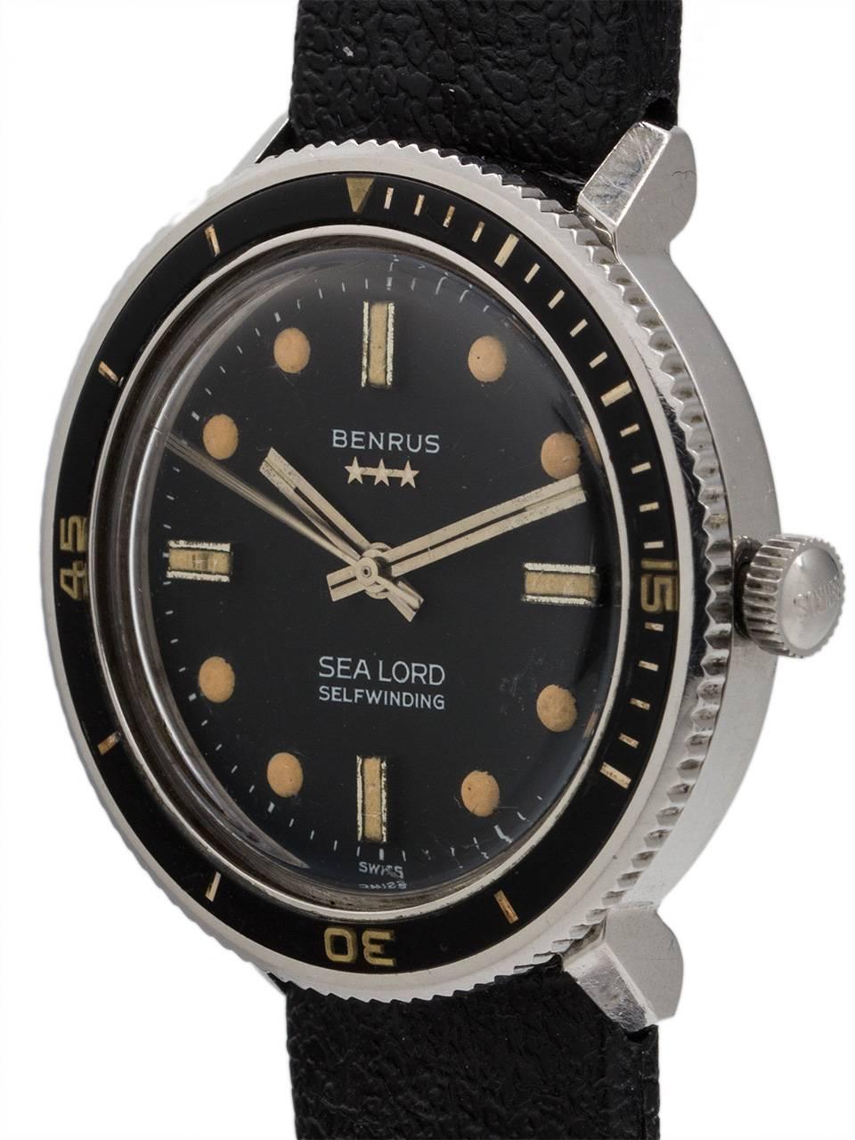 
Benrus stainless steel Sealord diver’s model featuring a 35mm diameter case with black elapsed time bezel, original black dial with large round luminous plots with beautiful warm patina and with silver match stick style hands. Signed Benrus crown.