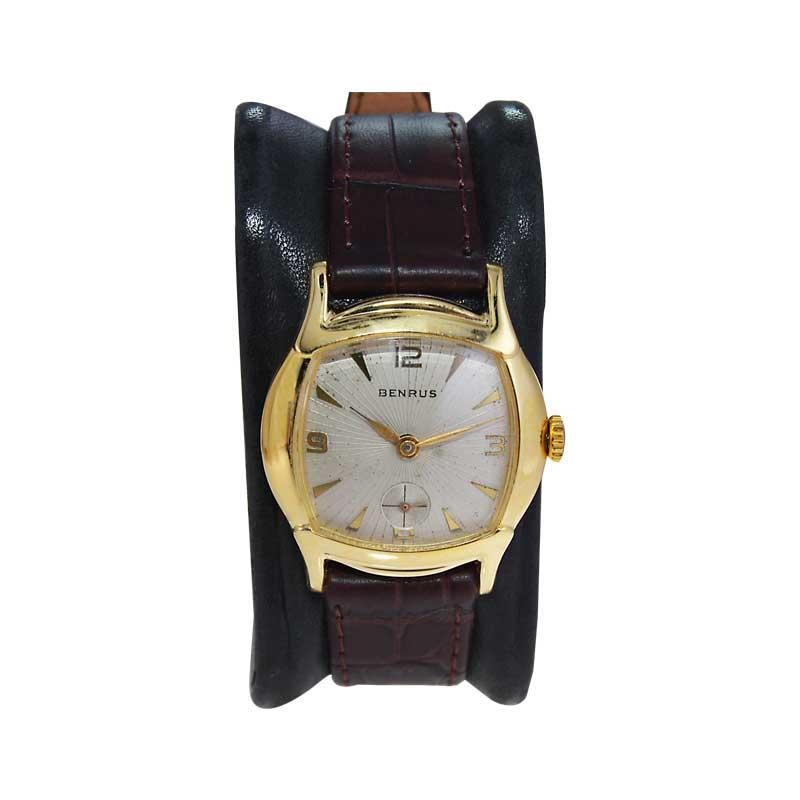 FACTORY / HOUSE: Benrus Watch Company
STYLE / REFERENCE: Art Deco / Cushion Shape
METAL / MATERIAL: Yellow Gold Filled 
CIRCA / YEAR: 1940's
DIMENSIONS / SIZE: Length 36mm x Width 30mm
MOVEMENT / CALIBER: Manual Winding / 17 Jewels
DIAL / HANDS:
