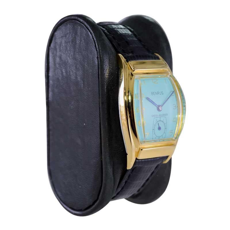 FACTORY / HOUSE: Benrus Watch Company
STYLE / REFERENCE: Art Deco
METAL / MATERIAL: Gold Filled
CIRCA / YEAR: 1940's
DIMENSIONS / SIZE: 38mm X 25mm
MOVEMENT / CALIBER: Manual Winding / 17 Jewels 
DIAL / HANDS: Custom Tiffany Blue Dial / Blued Steel