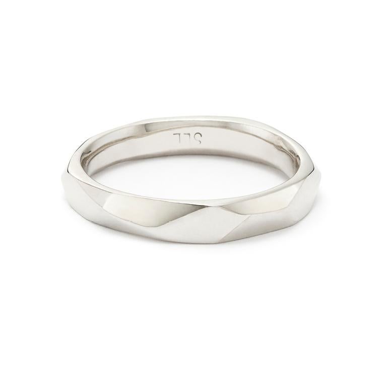 A modern take on the simple gold ring, Ben’s Band in 18 Karat White Gold, is a popular wedding band.

Also available in 18 Karat Yellow Gold or 18 Karat White Gold with Diamonds.

*Ring can be sized for a custom fit.

