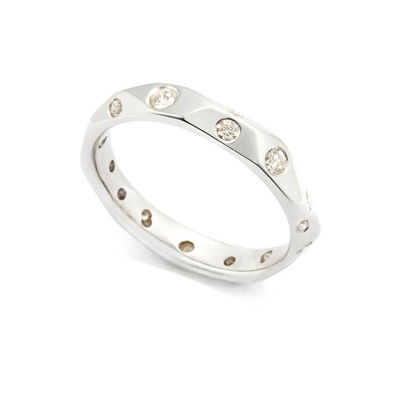Ben's Band, in 18 Karat White Gold with Diamonds, is a modern take on the simple gold ring and a popular choice as a wedding band.

Also available without Diamonds in 18 Karat Yellow or White Gold.

*Ring can be sized for a custom fit.