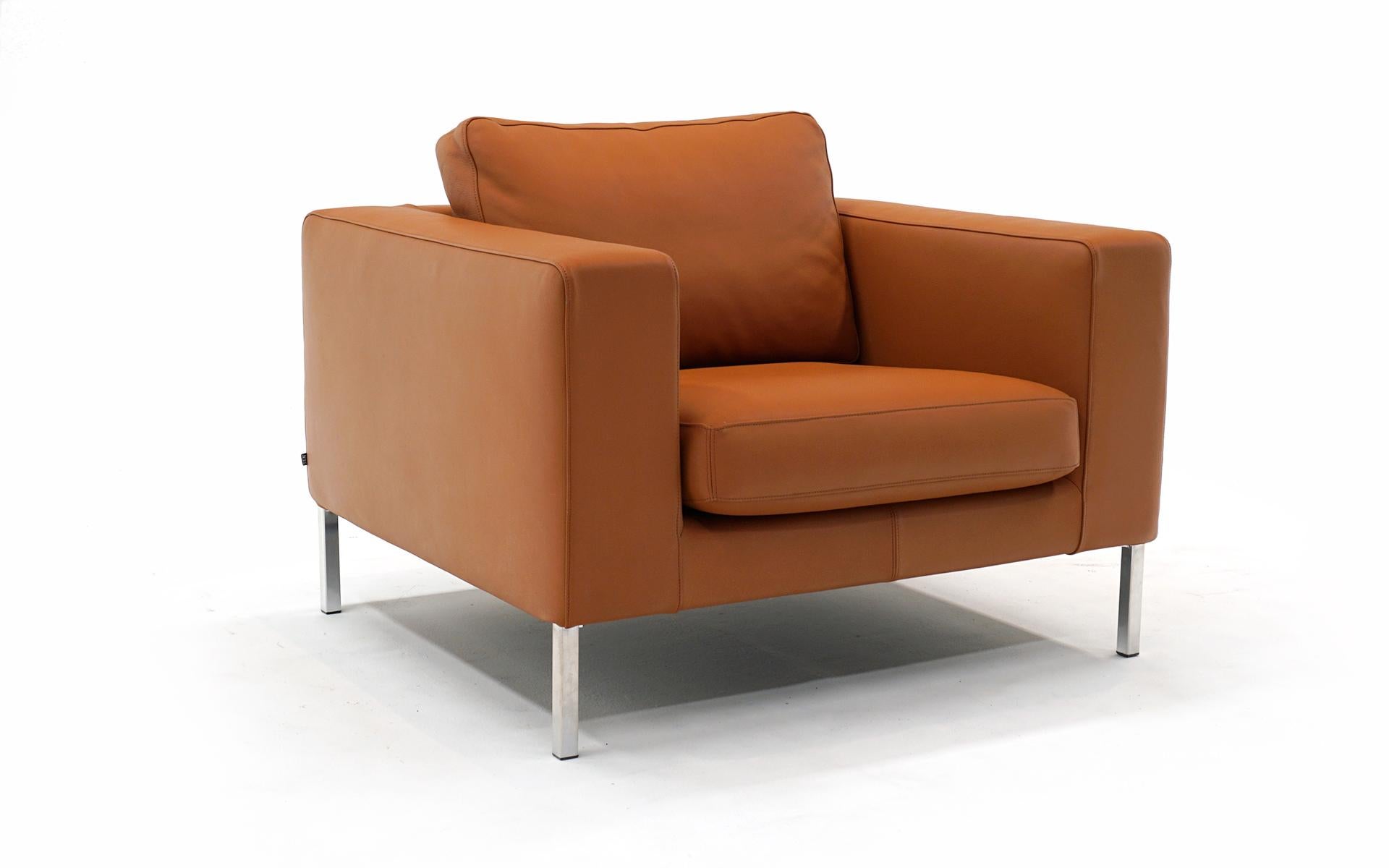 Neo Lounge chair designed by Niels Bendtsen for Bensen, Italy. This example is only a few years old and has seen very little use. Cognac / muted orange leather and chromed steel legs. Signed in the decking as well as labeled. No tears, scuffs,