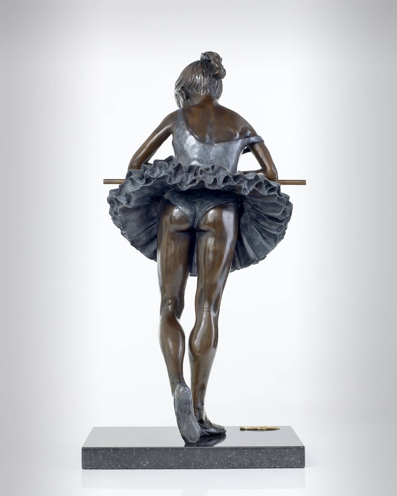 'Tutu' is a beautiful sculpture of a ballerina leaning 'en barre'. The elegance and grace of the ballerina is perfectly depicted in the sculpture.
Benson's theme is predominately the wonderful world of ballet and dancers, although some are beautiful