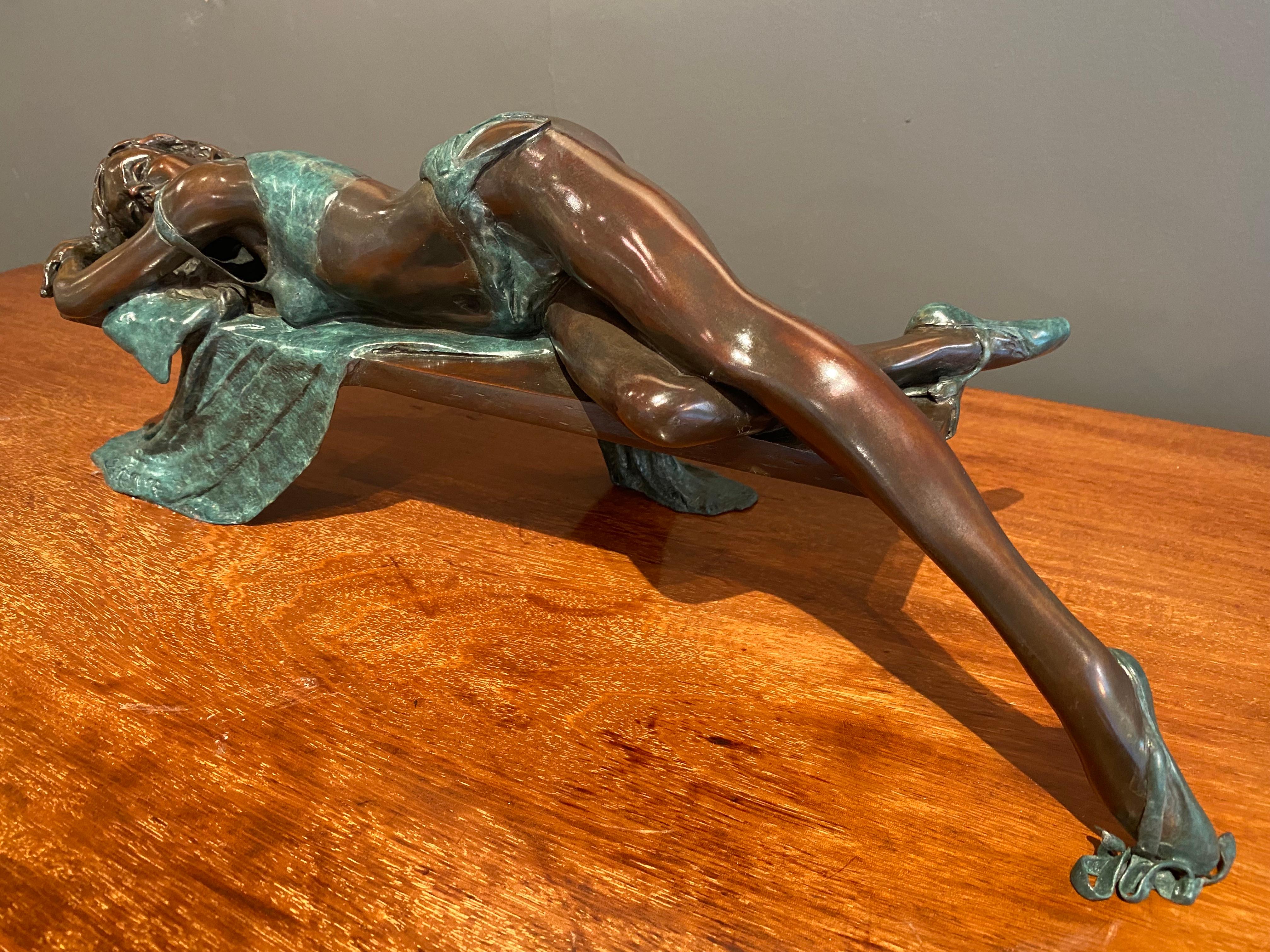 'Relaxing Dancer' by Benson Landes is a stunning 21st Century Solid Bronze Nude Figurative Ballet Dancer.
For Benson Landes, sculpture was most definitely a passion. His oeuvre of cast bronzes is populated with ‘off duty’ ballet dancers, rather