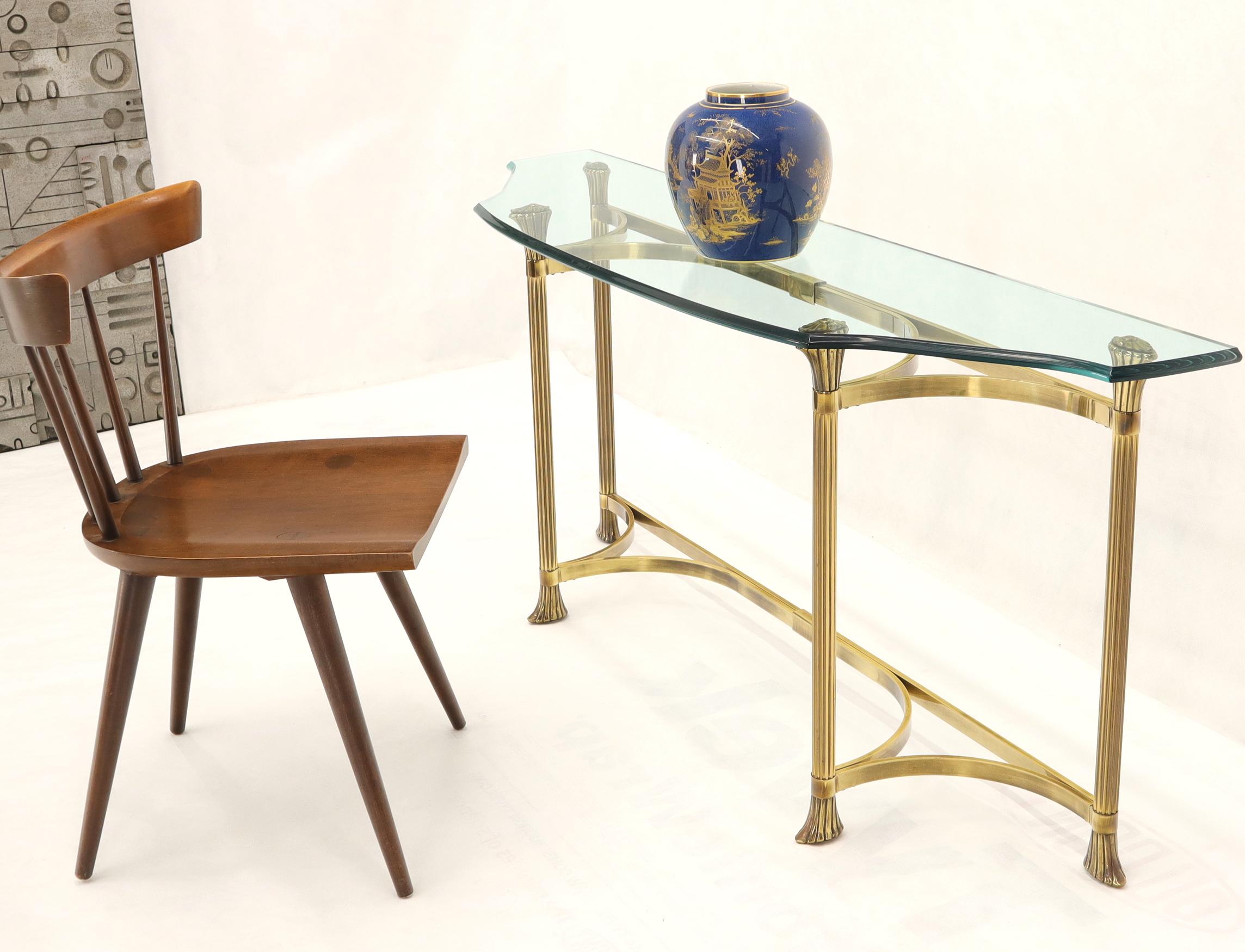 Mid-Century Modern brass and glass concave demilune shape top console table. In style of Mastercraft. NYC area delivery starts from $175.