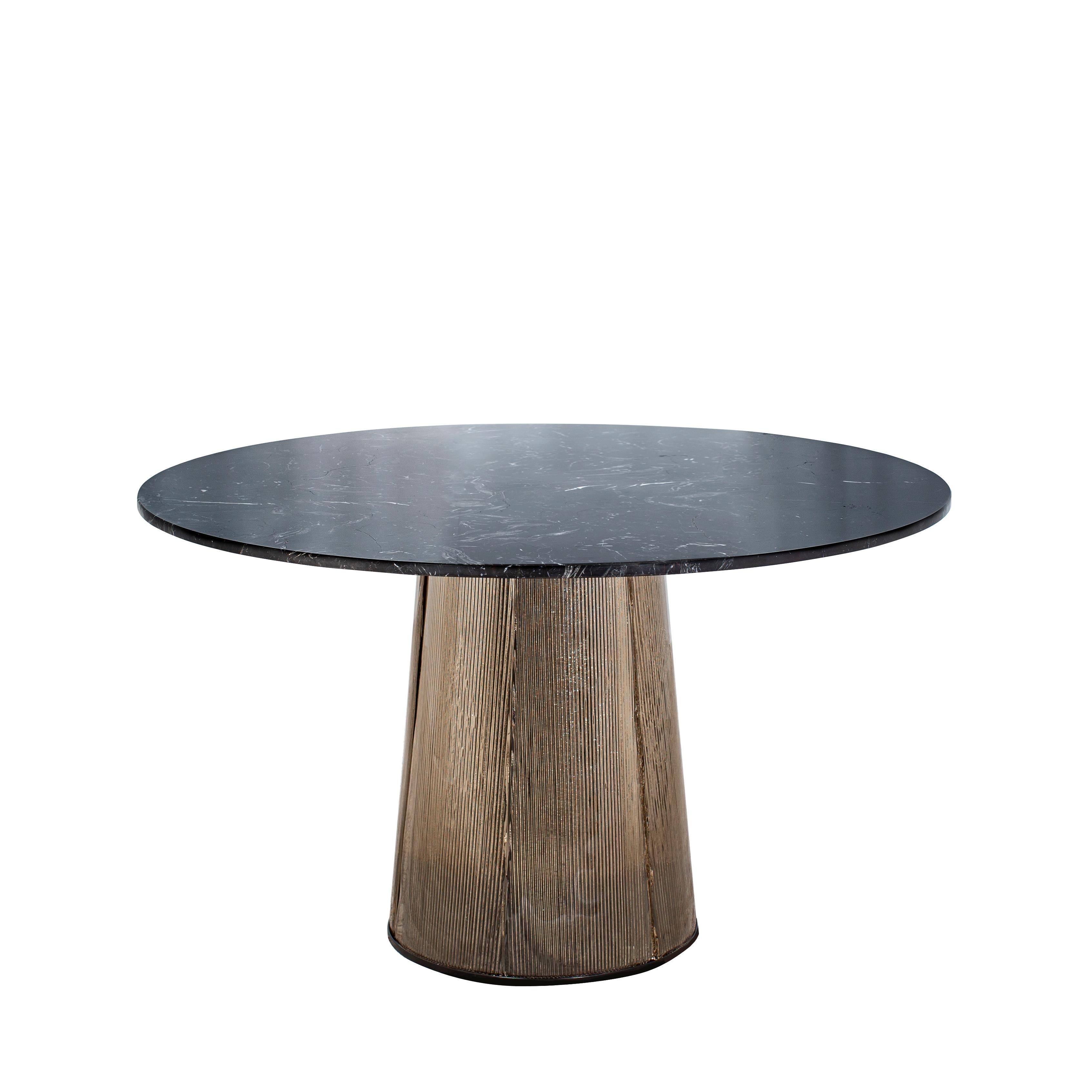 Bent dining table medium black smoky grey by Pulpo
Dimensions: D130 x H74 cm.
Materials: casted glass, carrara, black nero or light green marble table top.

Also available in different finishes and dimensions. 

Two kinds of material united in