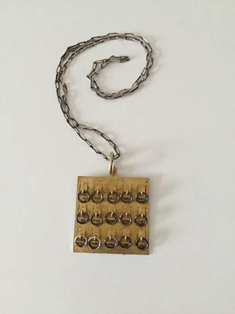 Modern Bent Exner Gilded Sterling Silver Pendant from 1979 For Sale