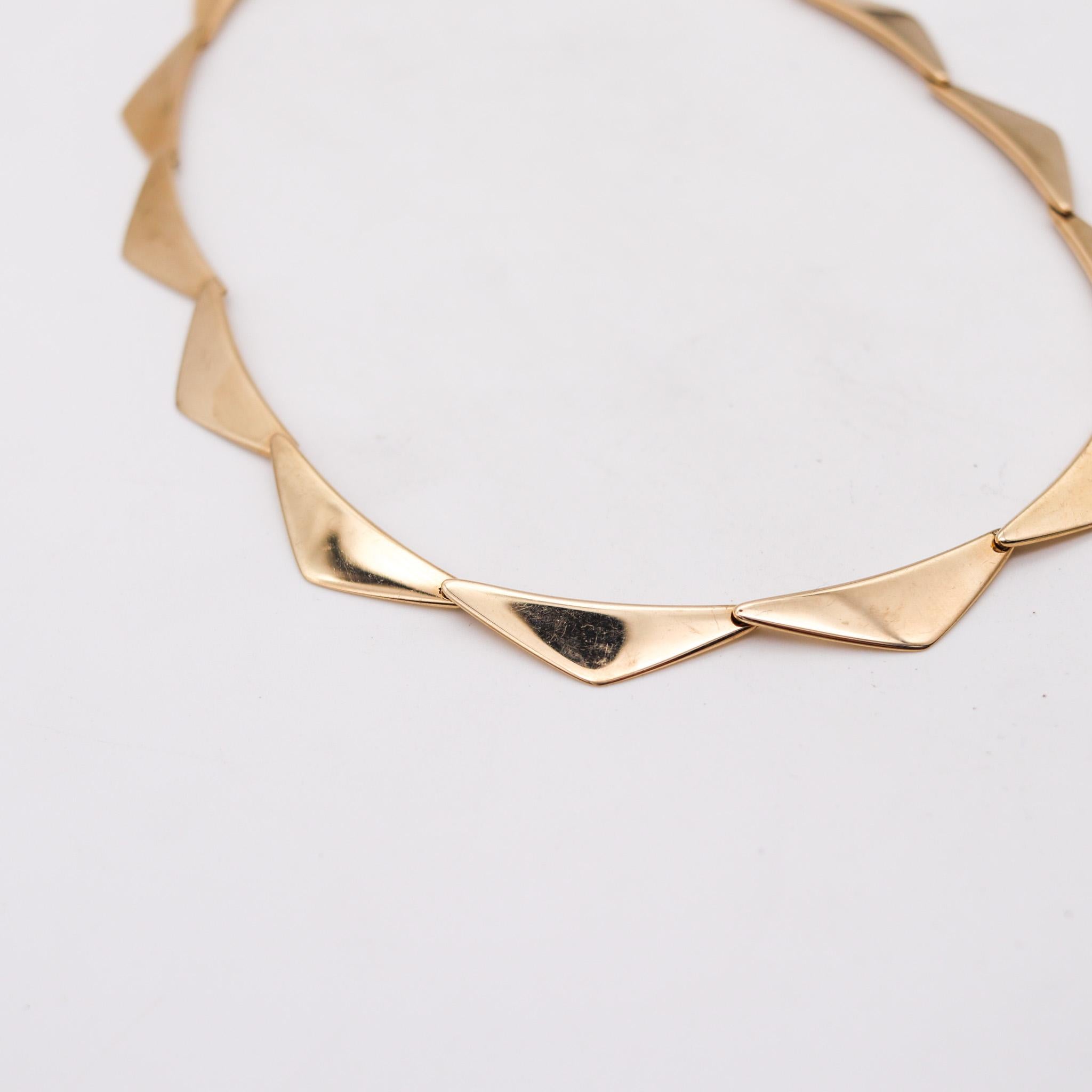 Geometric necklace designed by Bent Gabrielsen for Hans Hansen.

Great sculptural necklace, created in Denmark by the designer Bent Gabrielsen for the jewelry house Hans Hansen Company, back in the 1960. This peak necklace is the model 196 crafted