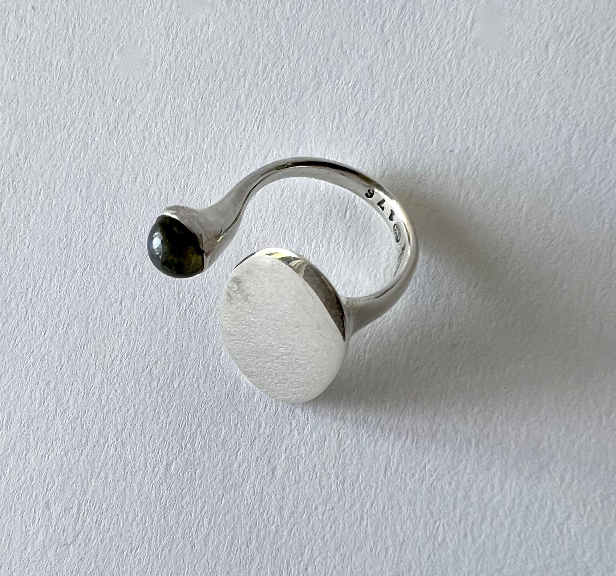 Bent Gabrielsen for Georg Jensen sterling silver and spectrolite or labradorite cabochon ring, circa 1970s.  Ring is a finger size 7.5 to 8 and is signed Georg Jensen, 925 S, 176, Denmark.  In very good vintage 1970s condition showing minimal wear