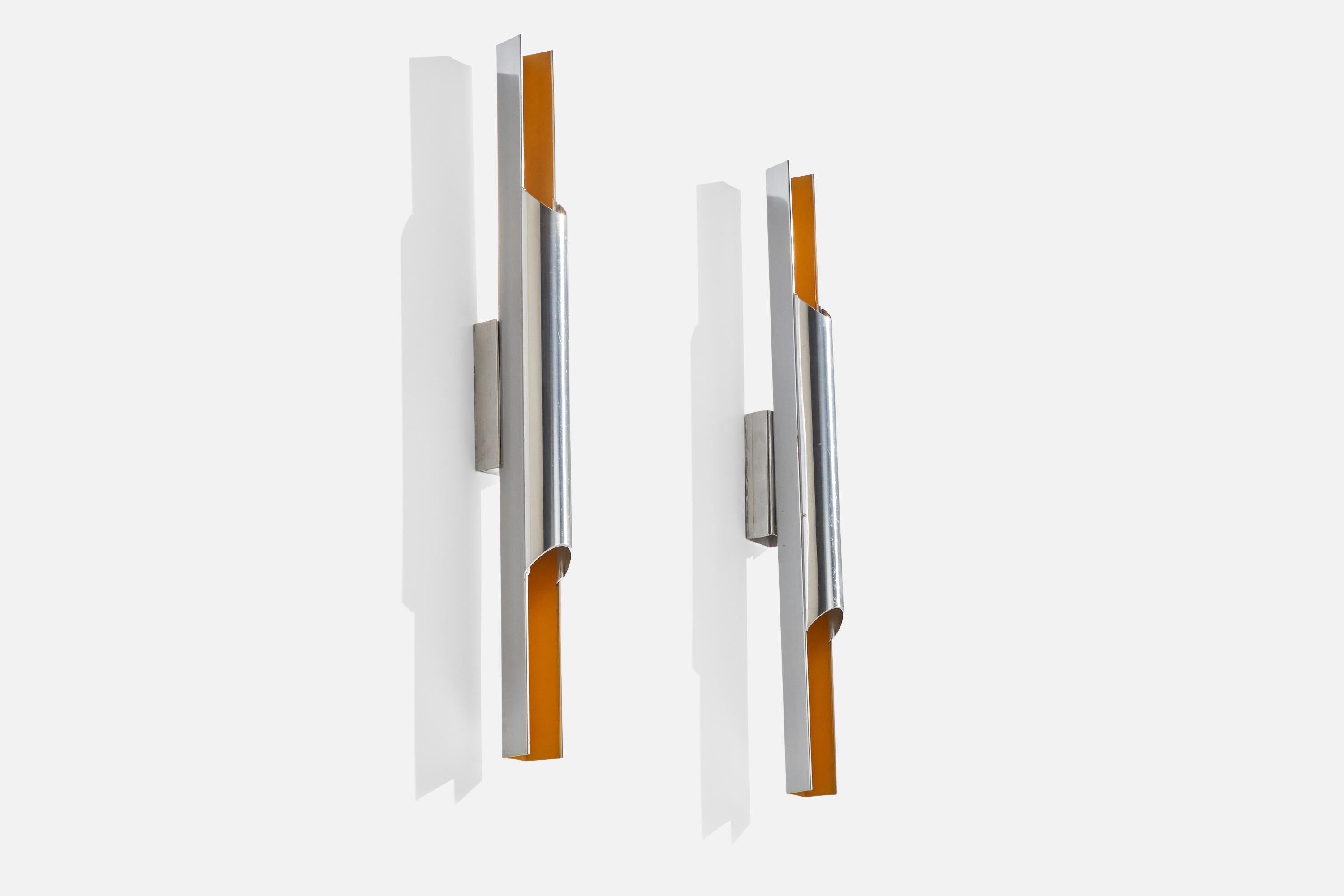 A pair of orange-lacquered aluminum wall lights designed by Bent Karlby and produced by Lyfa, Denmark, 1960s.

Overall Dimensions (inches): 23.75”  H x 1.8”  W x 3.5” D
Back Plate Dimensions (inches): 5” H x 1.5” W x 1”  D
Bulb Specifications: E-14