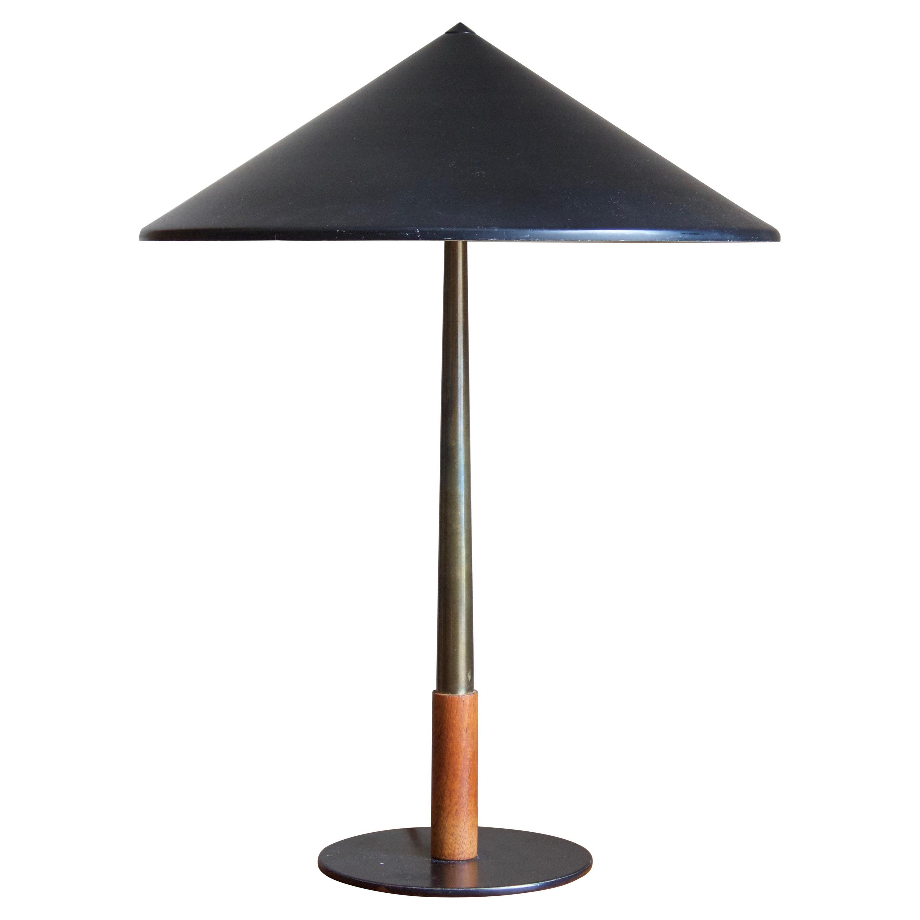 A modernist table lamp. Designed by Bent Karlby for Lyfa. Features a finely tapering rod. 

Other designers of the period include Paavo Tynell, Alvar Aalto, Kaare Klint, Josef Frank, and Lisa Johansson-Pape.