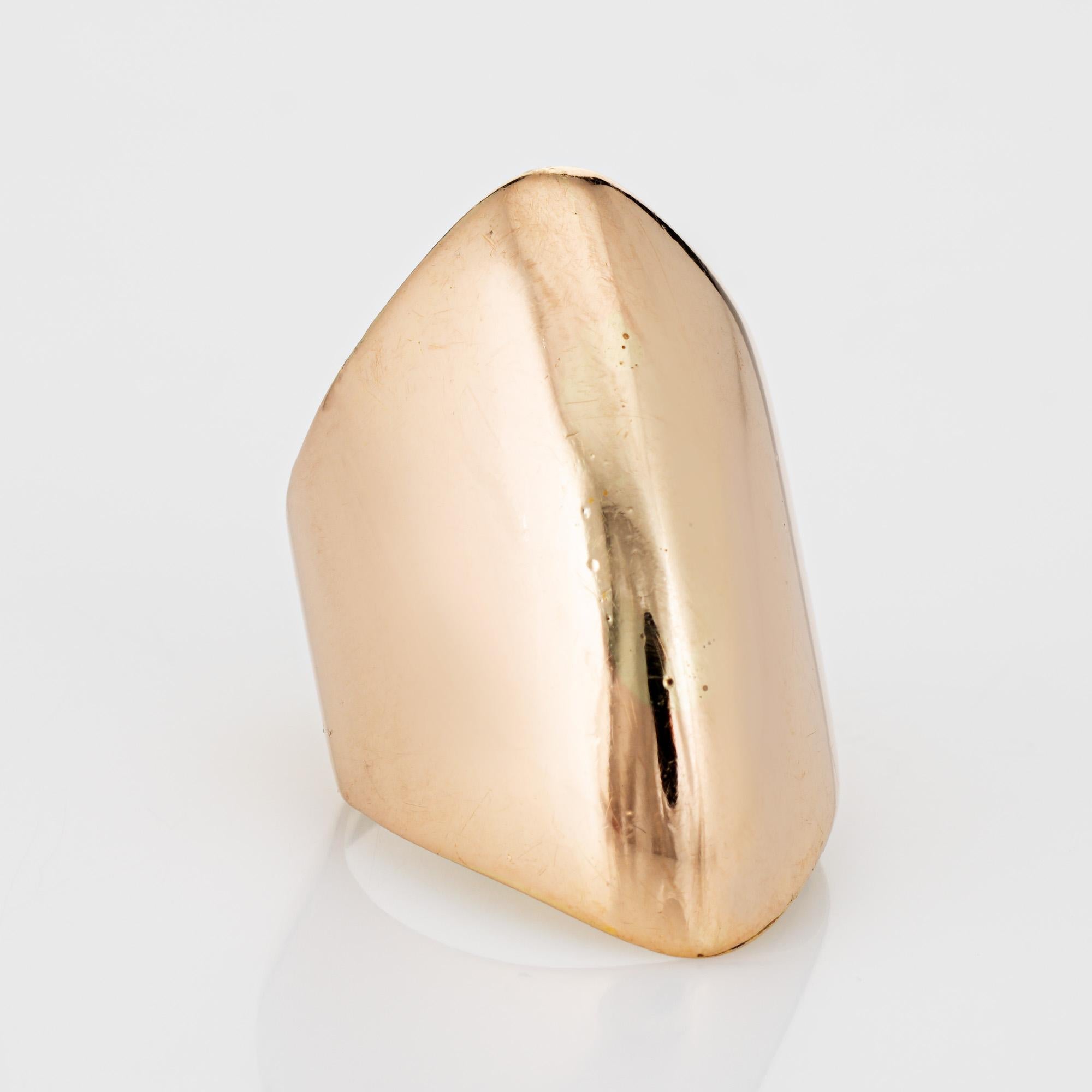 Stylish vintage domed cuff ring (circa 1960s to 1970s) crafted in 14 karat yellow gold. 

The sculptural ring is designed by sought after Danish designer Bent Knudsen. The domed cuff ring is long at 30mm (1.18 inches) in length and makes a great