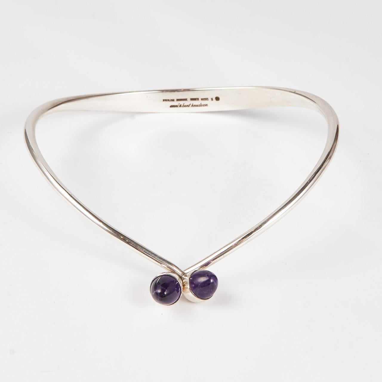 Bent Knudsen Sterling Silver Neck Ring with Amethyst Bullet Cabuchon


Designer: Bent Knudsen
Maker: Bent Knudsen
Design #:
Circa:
Dimensions: 4 5/8” x 5 1/4”
Country of Origin: Denmark

INV NO: Nec-06


**BENT KNUDSEN

Bent Knudsen (b.1924) and his