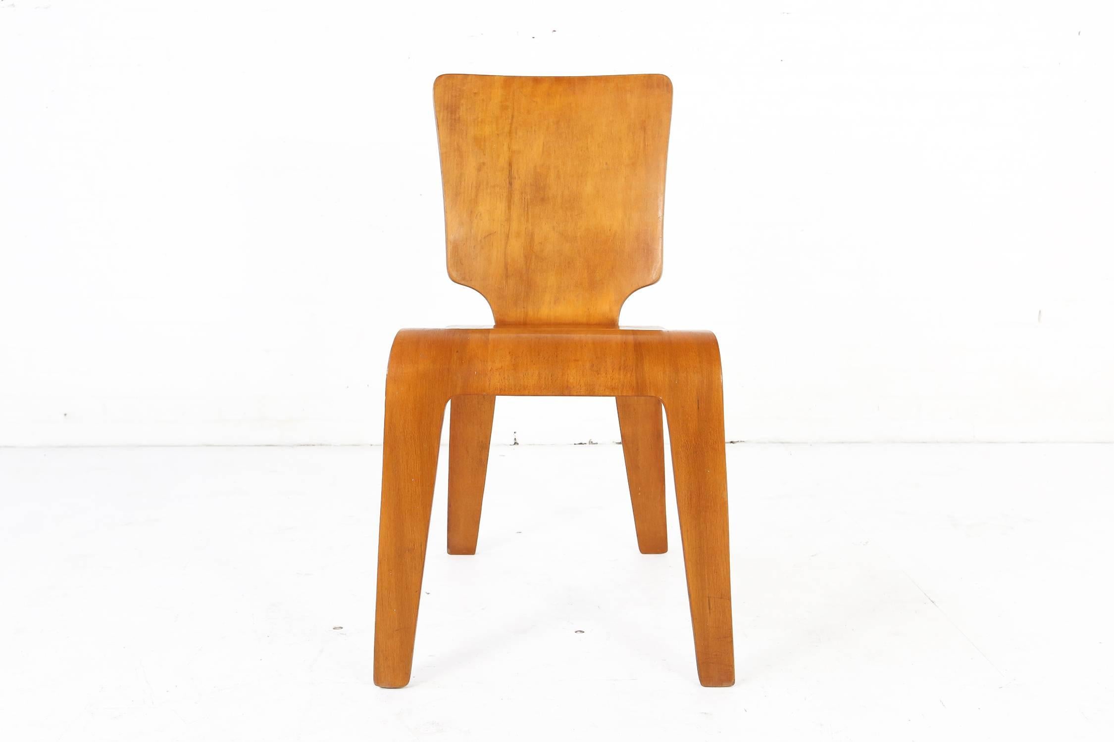 A molded plywood side chair by Herbert Von Thaden who during the period of the 1940s used building methods founded in World War II, using molded plywood in the manner of Eames, Eigerman, Han Pieck and other top designers of the period. Retains the