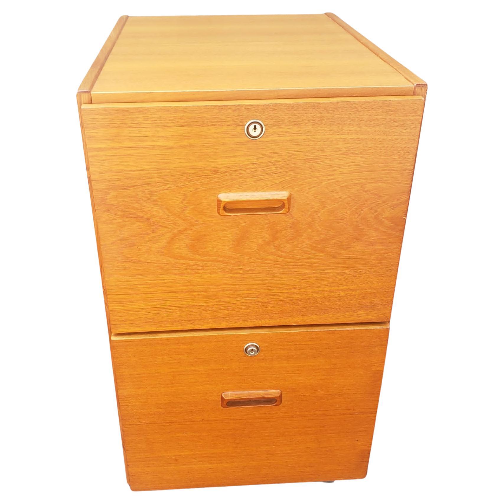 Beautiful Bent Silberg Danish Modern Teak Two-Drawer Rolling Filing Cabinet with built in file folder hanging rails. 
Measures 16.25